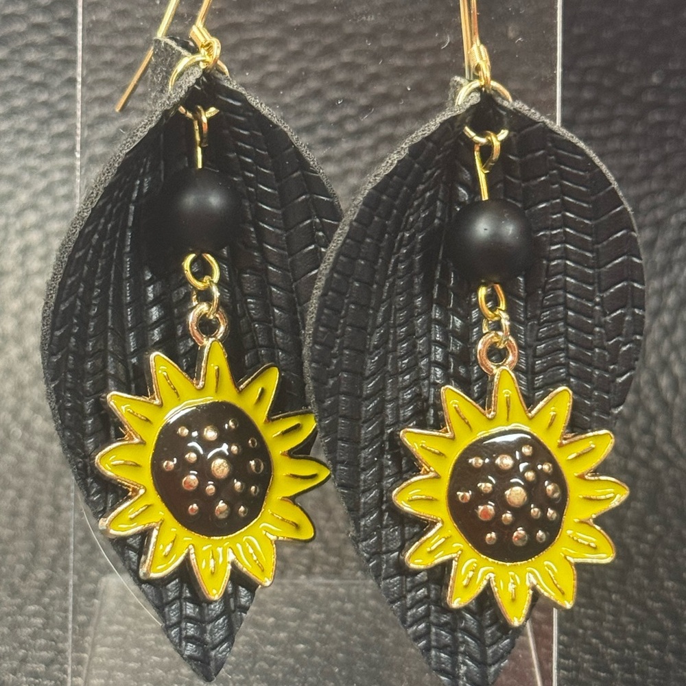 Handmade black with sunflowers pinched earrings